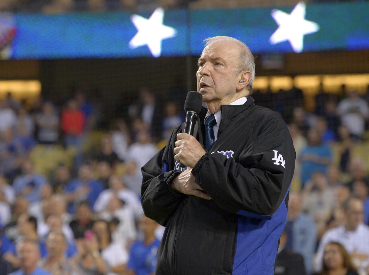 Frank Sinatra Jr. sings the national anthem before a 2015 game between the Dodgers and the Pittsburgh Pirates in Los Angeles.