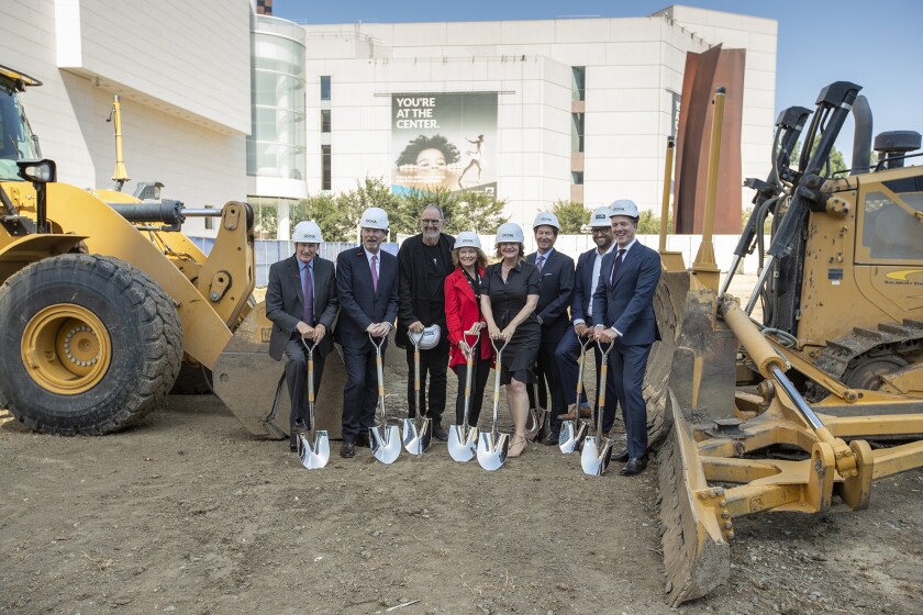 Architect Thom Mayne, third from left, helps officials break ground Friday for the Orange County Museum of Art's new location at the Segerstrom Center for the Arts in Costa Mesa.