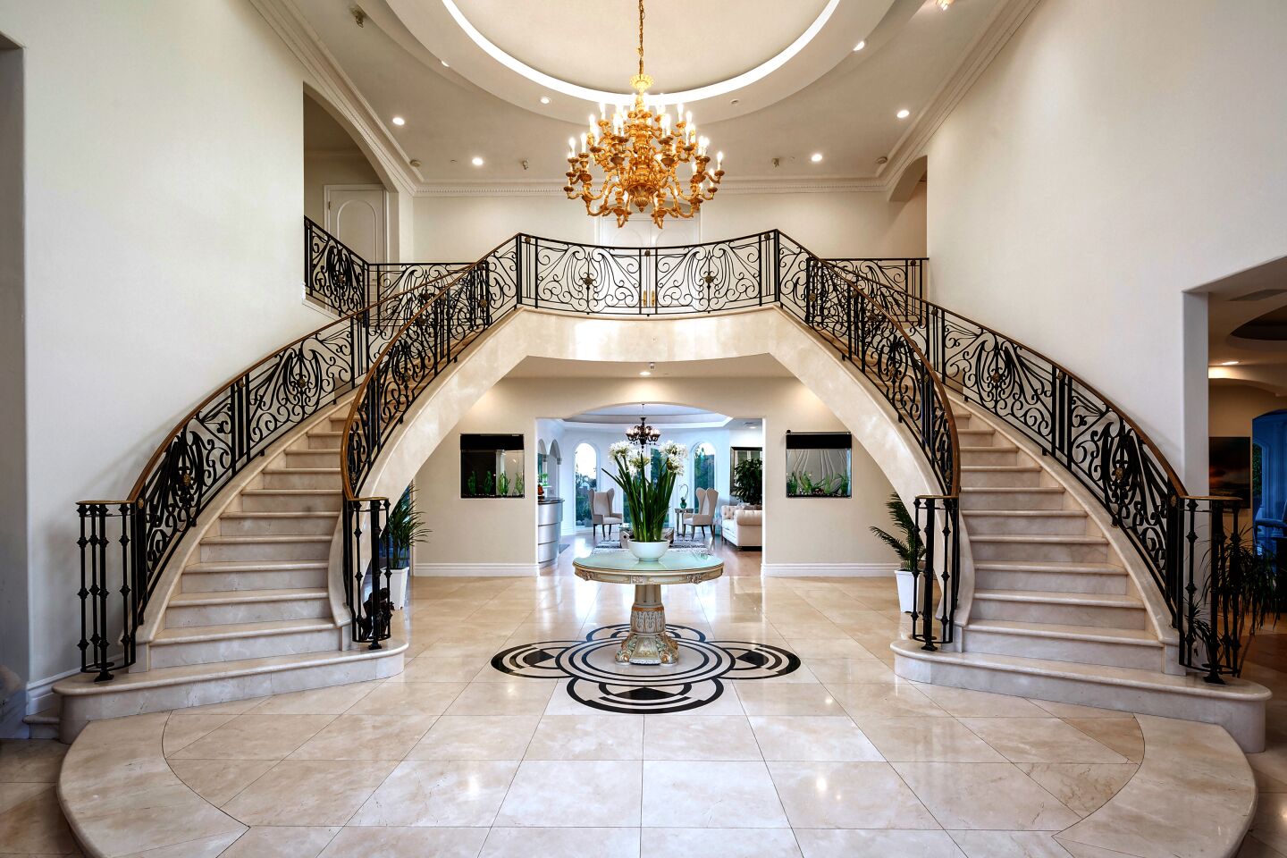 Hungarian curlers György Nagy and Ildikó Szekeres paid $6.1 million for this mansion in Bel-Air. The home has a grand foyer with a sweeping staircase.