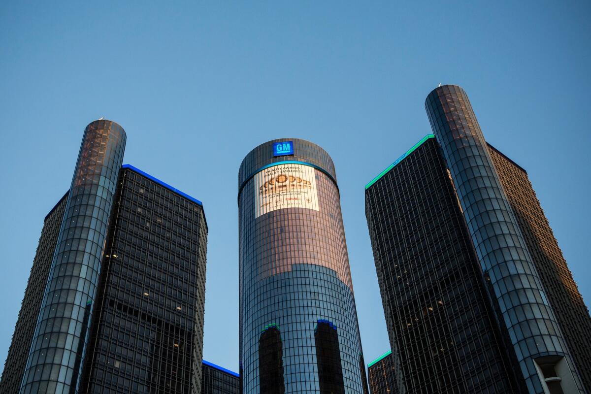 The General Motors logo sits atop the company's headquarters last year in Detroit.