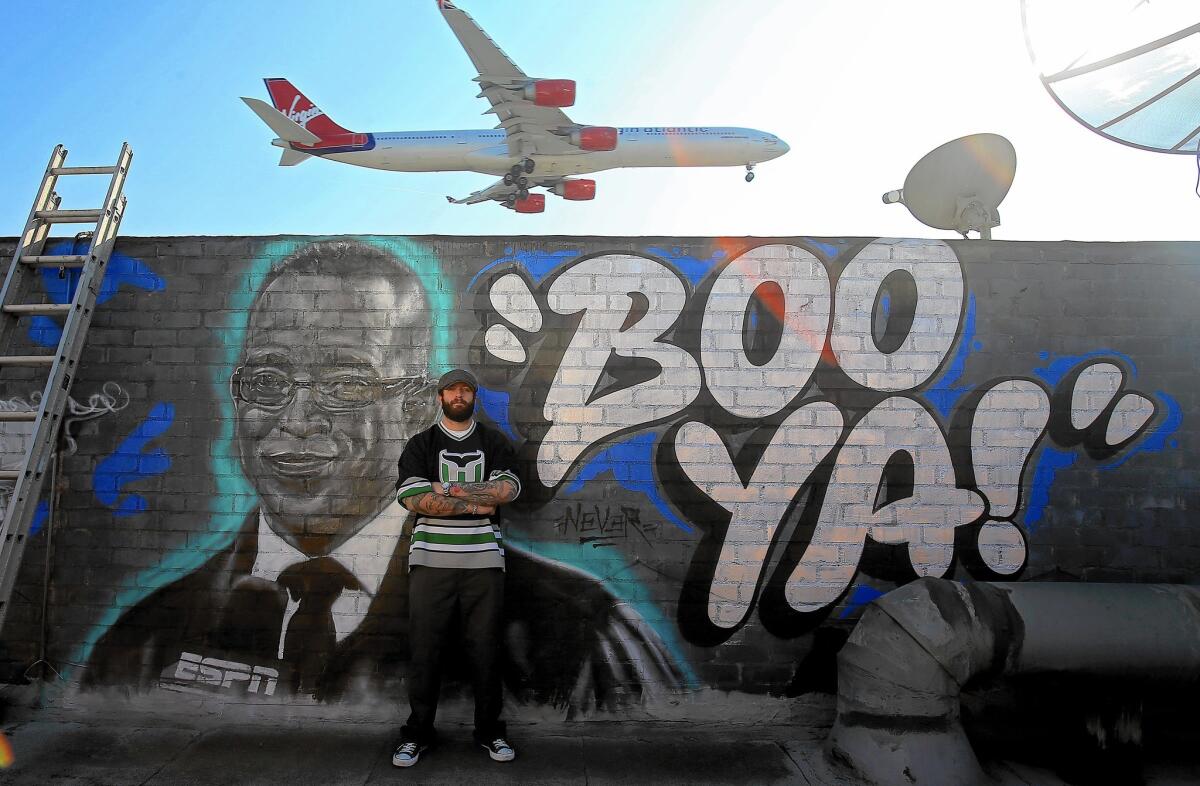 A mural painted by Los Angeles graffiti artist Jonas Swyer honors the late ESPN sportscaster Stuart Scott.
