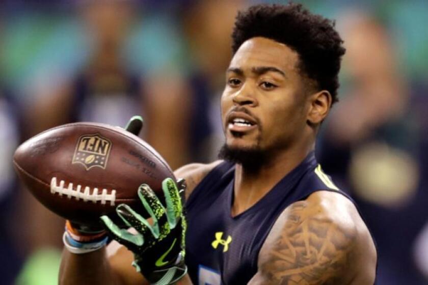 FILE - In this March 6, 2017, file photo, Ohio State defensive back Gareon Conley runs a drill at the NFL football scouting combine in Indianapolis. An attorney for the former Ohio State star says the player denies an accusation made in a police report released Tuesday, April 25, 2017, that he sexually assaulted a woman. No charges have been filed and the incident is still being investigated by police. (AP Photo/David J. Phillip, File)
