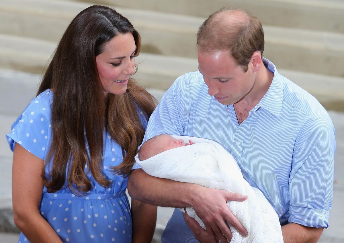 Prince William, Duke of Cambridge, and Catherine, Duchess of Cambridge, with their newborn son.