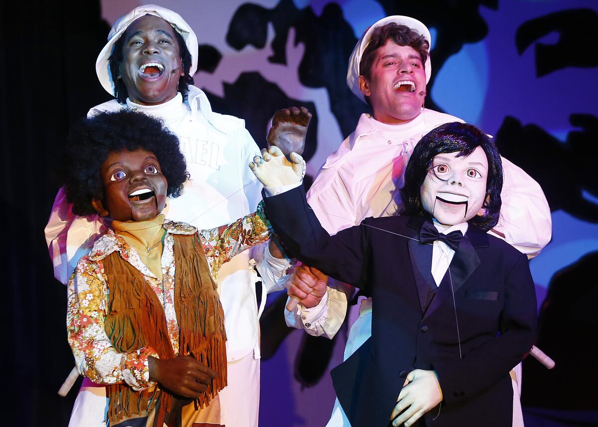 Eric B. Anthony, left, and Justin Anthony Long play puppet versions of Michael Jackson and Donny Osmond in the new parody "For the Love of a Glove."