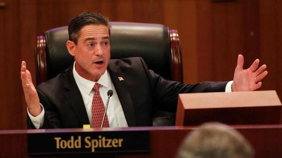 Orange County Supervisor Todd Spitzer, shown at a supervisors' meeting in June, raised questions about the county's no-bid contract with Motorola for a law enforcement radio system.