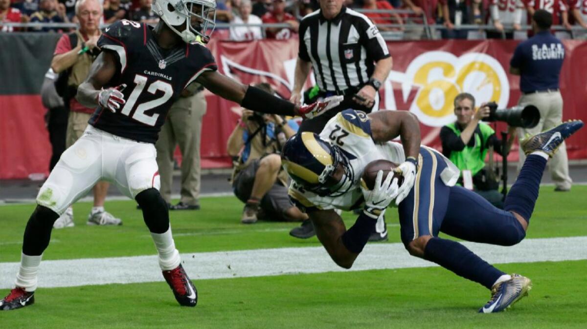 Rams cornerback Trumaine Johnson intercepts a pass intended for John Brown during the second quarter of L.A.'s 17-13 victory over the Cardinals on Oct. 2.