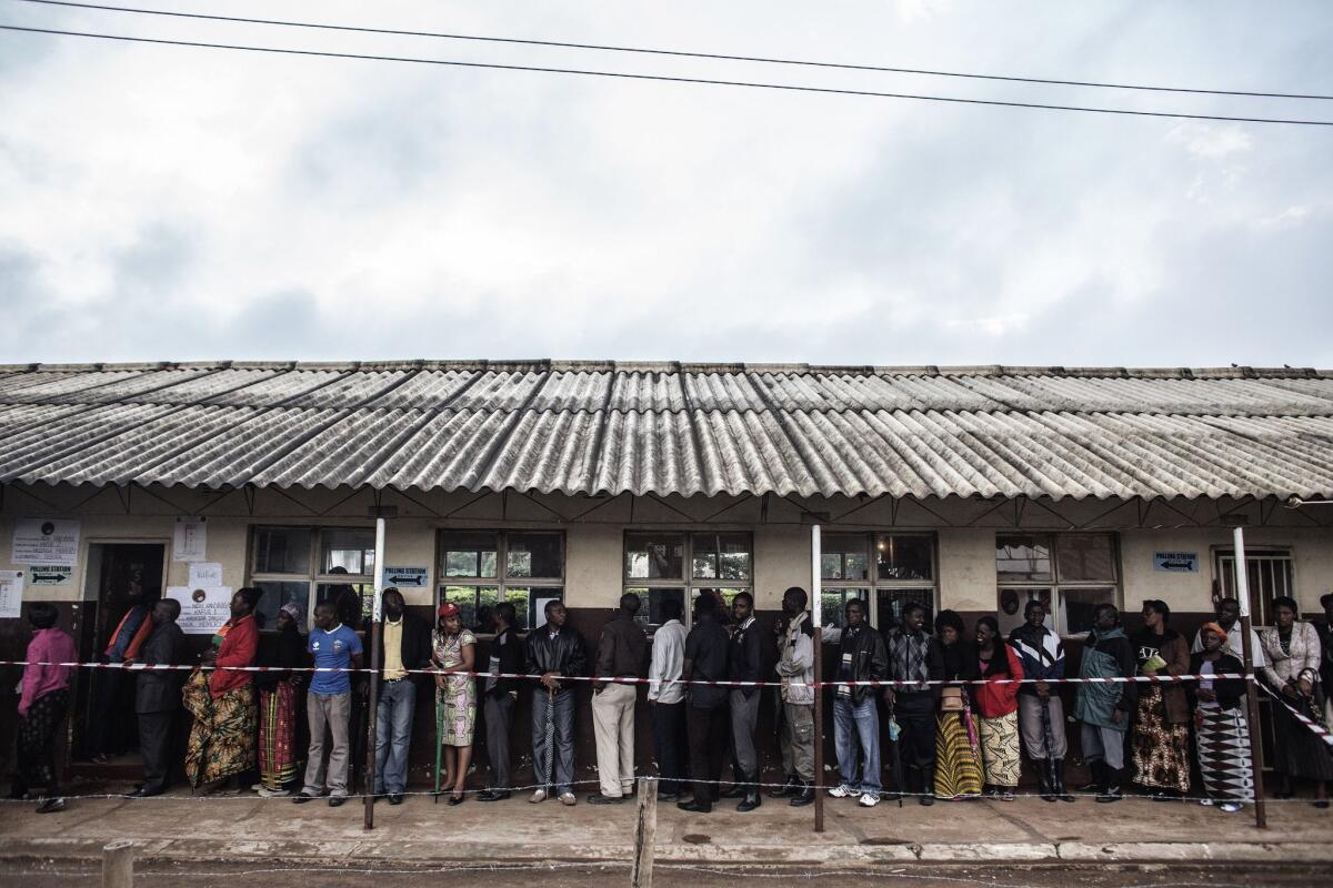 Zambians line up to vote in the presidential election in the capital, Lusaka.