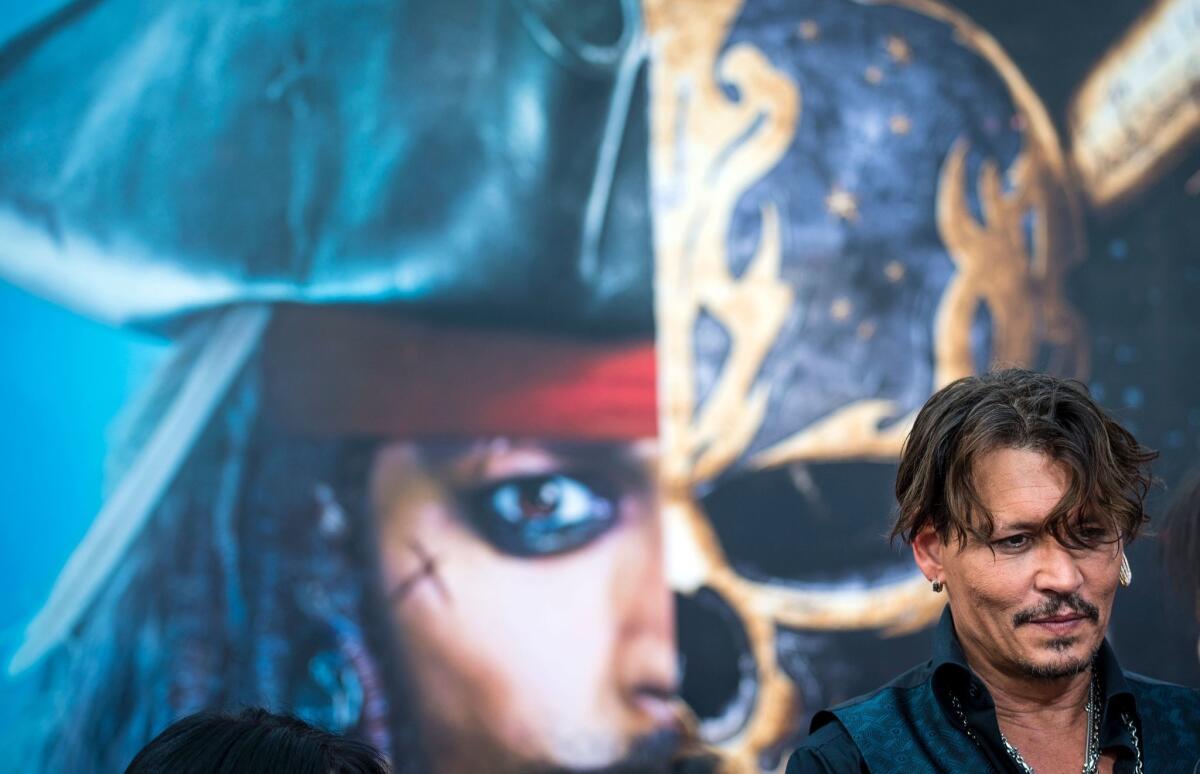 Actor Johnny Depp arrives for the world premiere of Disney movie "Pirates of the Caribbean: Dead Men Tell No Tales" in Shanghai on May 11, 2017.