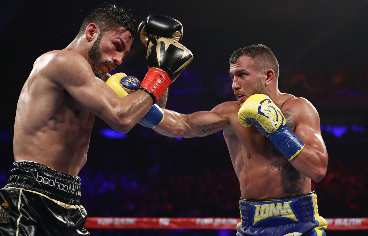 Vasiliy Lomachenko punches Jorge Linares during their WBA lightweight title fight at Madison Square Garden on May 12, 2018 in New York City.