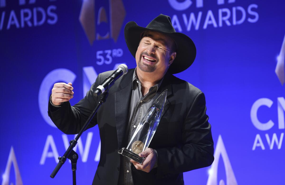 Singer-songwriter Garth Brooks after winning the entertainer of the year award at the 53rd annual CMA Awards.