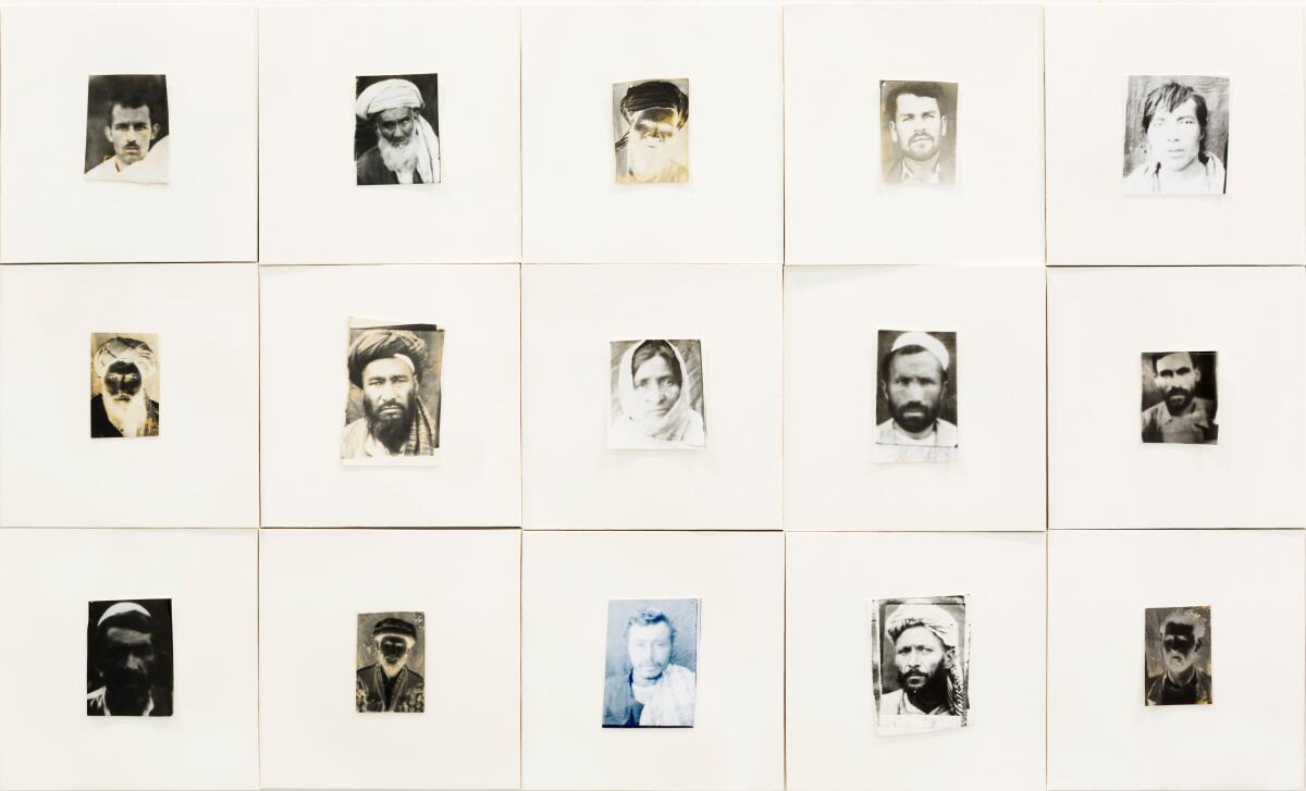 Rows of photos framed in big white mats reveal the weary faces of Afghan citizens during the war