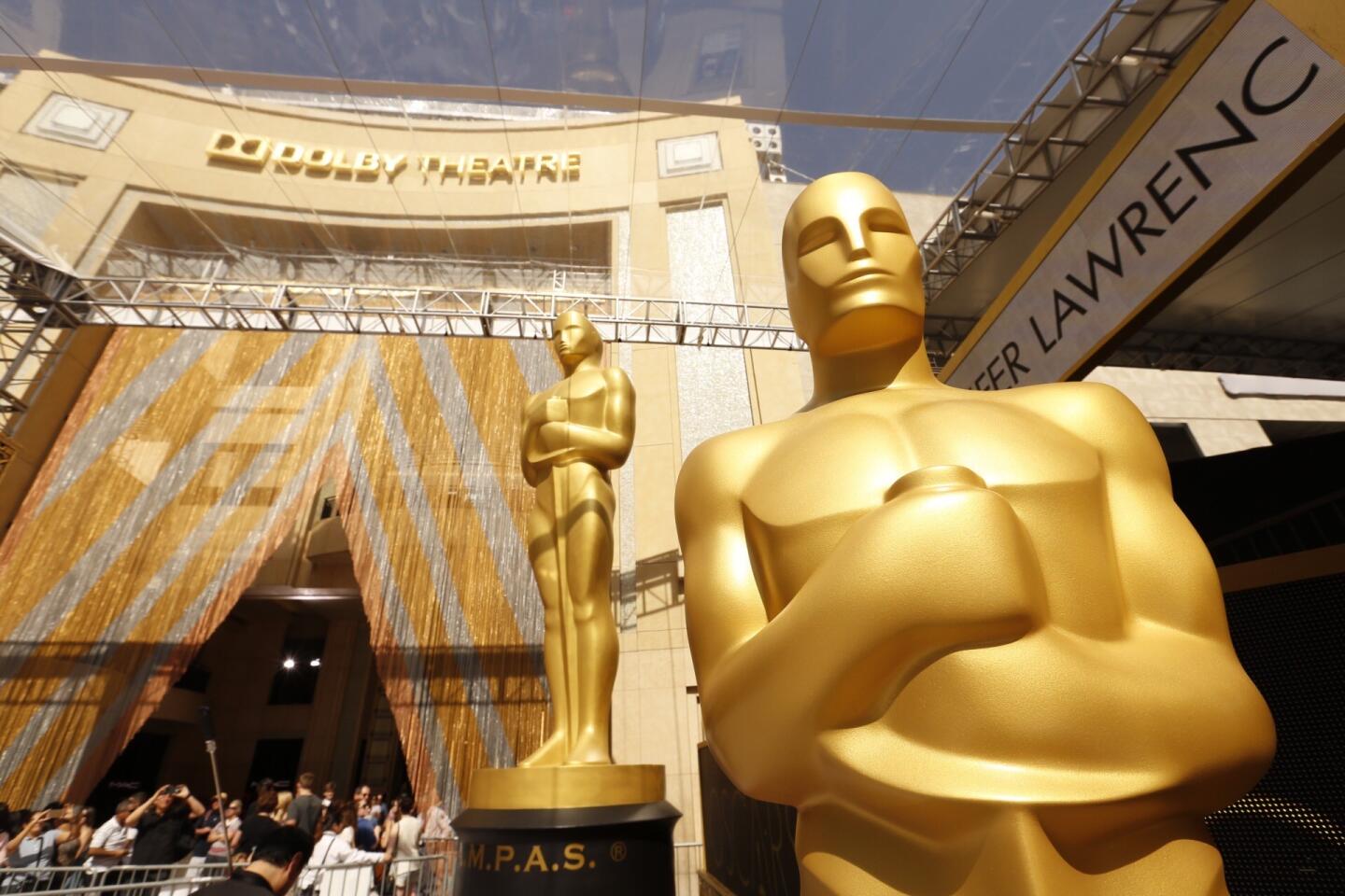 Oscar statues are uncovered on the red carpet as preparations continue for the 88th annual Academy Awards in Hollywood.