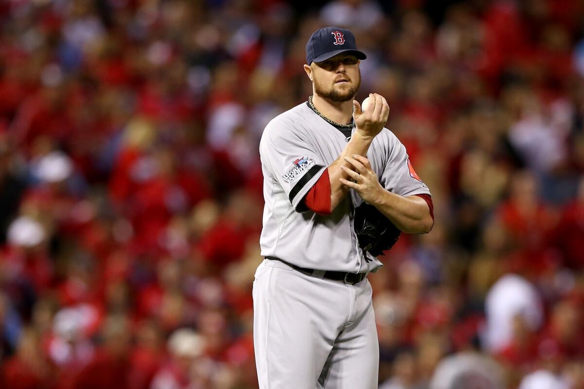 Boston Red Sox starter Jon Lester came out a winner in his pitching duel with the St. Louis Cardinals' Adam Wainwright in Game 5 of the World Series on Monday.