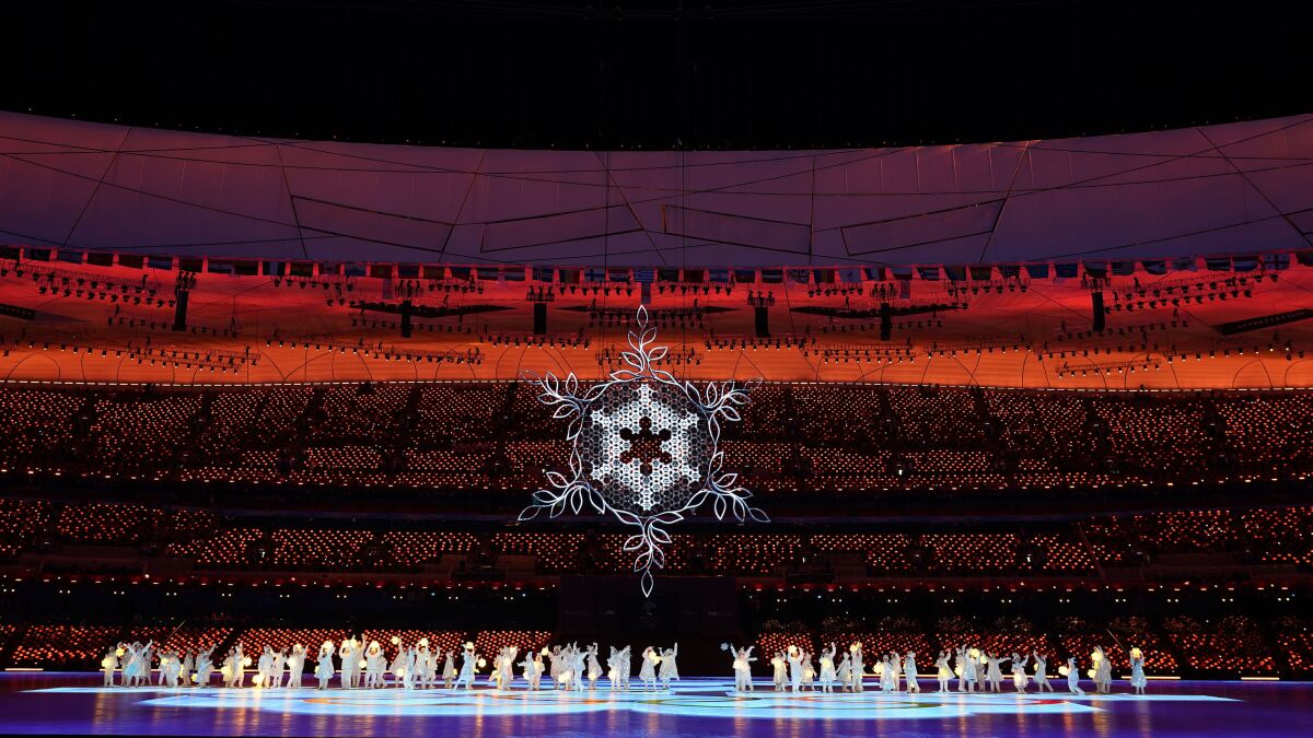 Dancers perform at the 2022 Olympics.