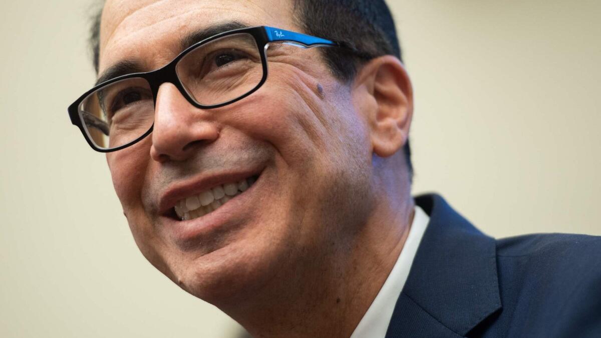 Secretary of Treasury Steven T. Mnuchin testifies during a House Committee on Financial Services hearing on Capitol Hill on Wednesday.