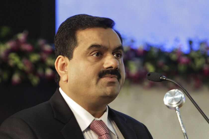 Gautam Adani speaks during the inauguration of Vibrant Gujarat Global Investor summit in Gandhinagar, India, Jan. 12, 2011. Embattled Indian billionaire Adani called off his flagship company's $2.5 billion share sale late Wednesday, Feb. 1. 2023, after a tumultuous week saw his conglomerate shed tens of billions of dollars in market value after claims of fraud from a U.S.-based short-selling firm. (AP Photo/Ajit Solanki)