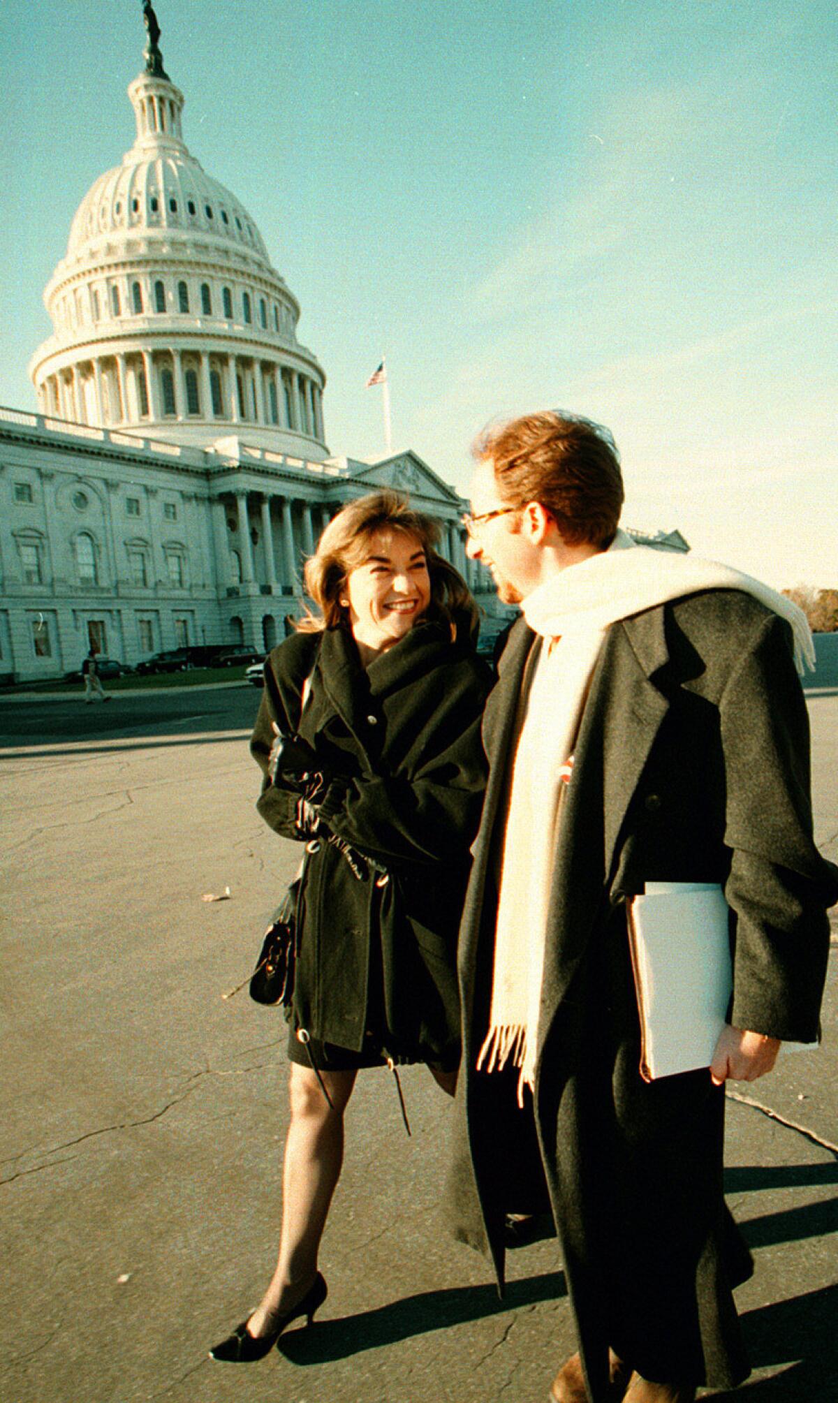 Loretta Sanchez, with her campaign manager John Shallman, arrives in Washington in 1996 for orientation sessions for new members of Congress. (Alex Garcia / Los Angeles Times)