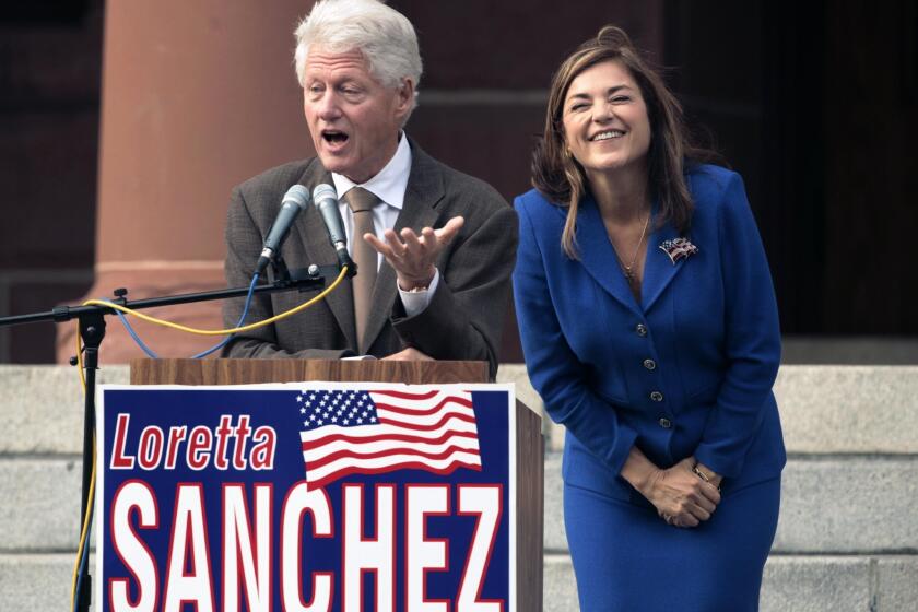 Rep. Loretta Sanchez (D–Garden Grove) campaigning for reelection in 2010 with former President Bill Clinton in Santa Ana.