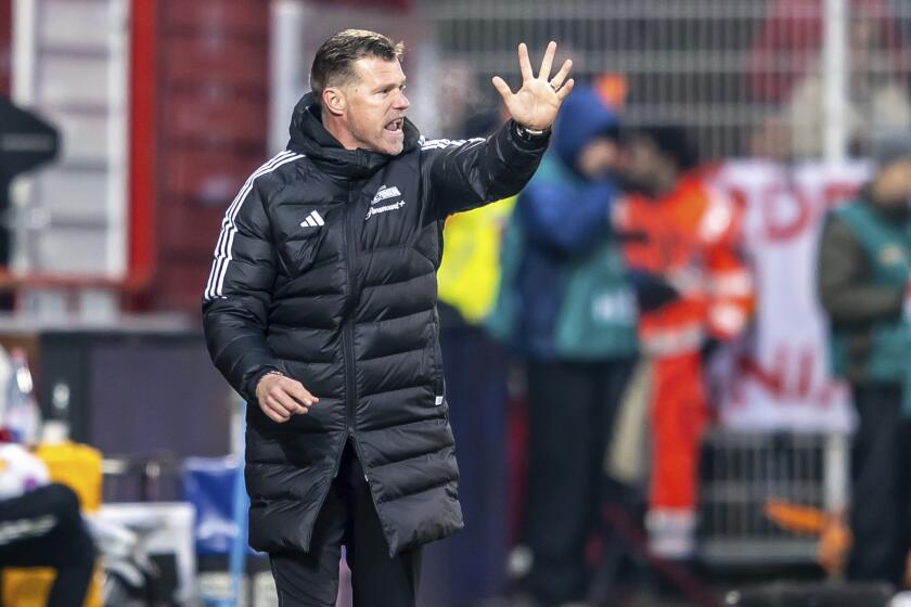 FILE - Union's then interim coach Marco Grote gestures during the German Bundesliga soccer match between 1. FC Union Berlin and FC Augsburg in Berlin, Germany, Saturday, Nov. 25, 2023. Union Berlin has fired Nenad Bjelica as coach and appointed Marco Grote in his place to save the team from Bundesliga relegation. Union says Bjelica and his assistants were told Monday morning they had to go. Grote becomes interim coach for the second time this season after taking over from longtime-favorite Urs Fischer. (Andreas Gora/dpa via AP, File)