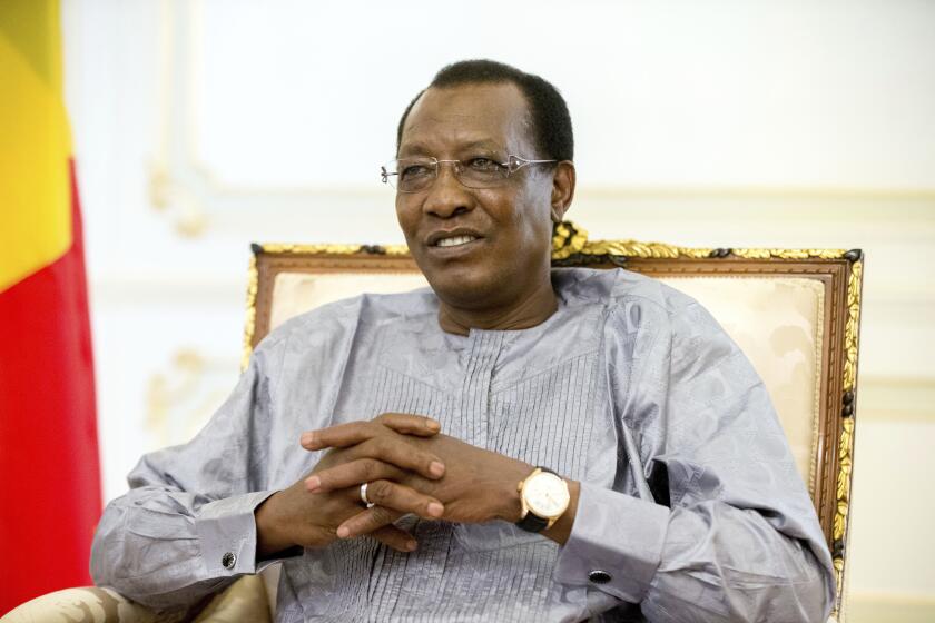 FILE - In this Wednesday, April 20, 2016 file photo, Chadian President Idriss Deby Itno meets with U.S. Ambassador to the United Nations Samantha Power at the presidential palace in N'Djamena, Chad, Wednesday, April 20, 2016. Chadian President Idriss Deby Itno, who ruled the central African nation for more than three decades, was killed on the battlefield Tuesday, April 20, 2021 in a fight against rebels, the country's top military commander announced on national television and radio. (AP Photo/Andrew Harnik, File)