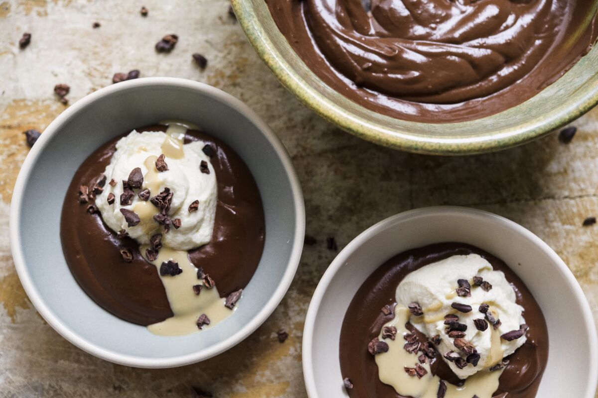 This image released by Milk Street shows a recipe for Chocolate-Tahini Pudding. (Milk Street via AP)