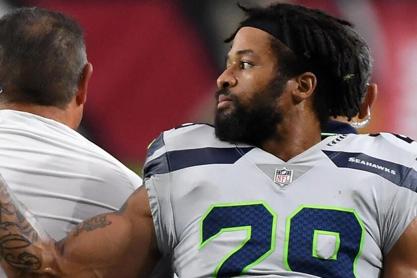 GLENDALE, AZ - SEPTEMBER 30: Defensive back Earl Thomas #29 of the Seattle Seahawks gestures as he leaves the field on a cart after being injured during the fourth quarter against the Arizona Cardinals at State Farm Stadium on September 30, 2018 in Glendale, Arizona. (Photo by Norm Hall/Getty Images) ** OUTS - ELSENT, FPG, CM - OUTS * NM, PH, VA if sourced by CT, LA or MoD **