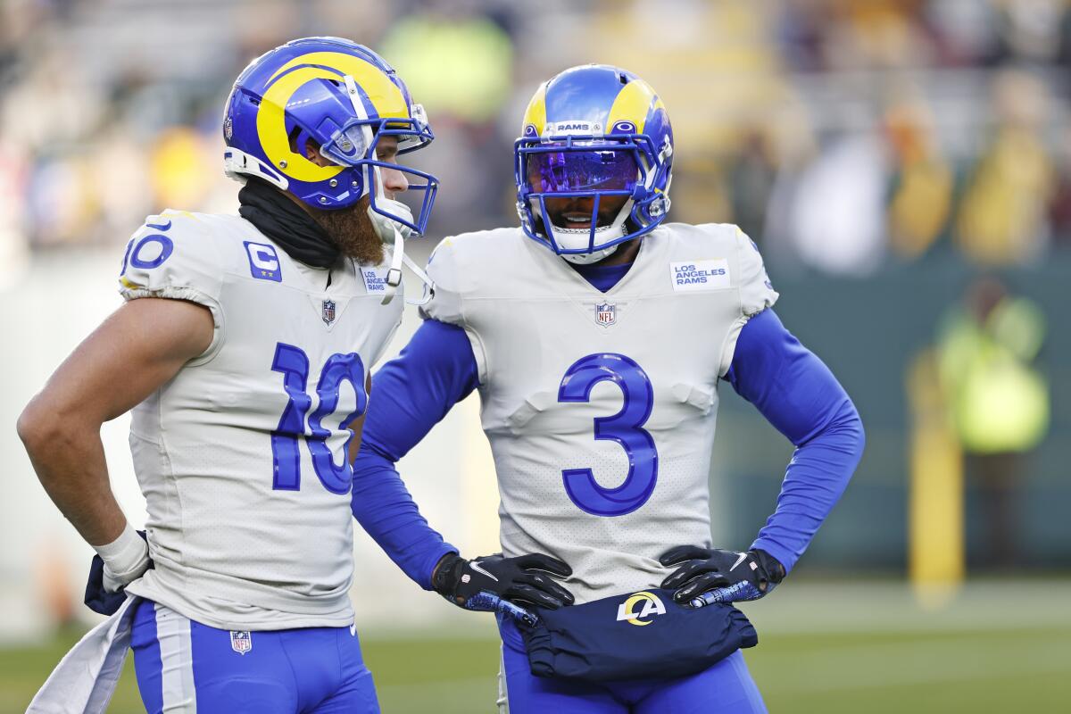 Rams wide receivers Cooper Kupp, left, and Odell Beckham Jr. talk.