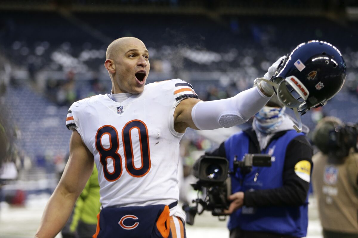 Chicago Bears tight end Jimmy Graham motions to fans as he heads off the field after a win over the Seattle Seahawks.