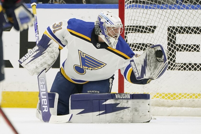 St. Louis Blues emergency goaltender Kyle Konin warms up before an NHL hockey game against the Tampa Bay Lightning Thursday, Dec. 2, 2021, in Tampa, Fla. Konin was called into service when goaltender Jordan Binnington was diagnosed with coronavirus. (AP Photo/Chris O'Meara)