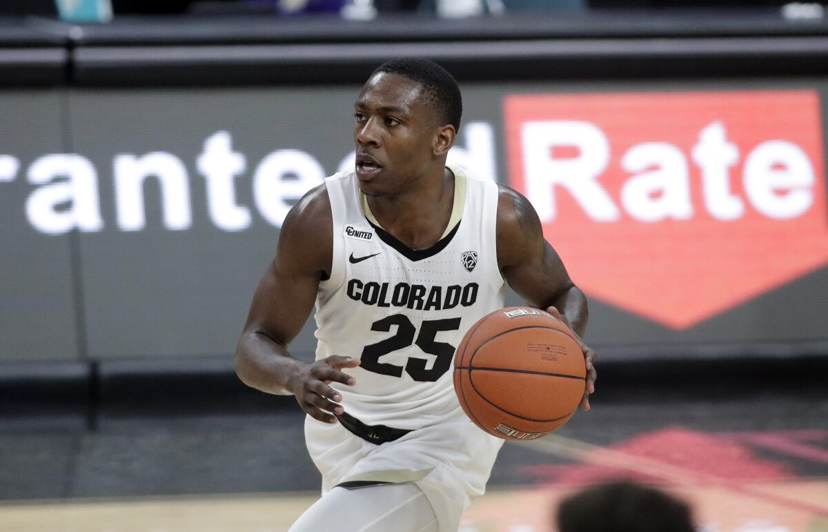 Colorado's McKinley Wright plays against Washington.