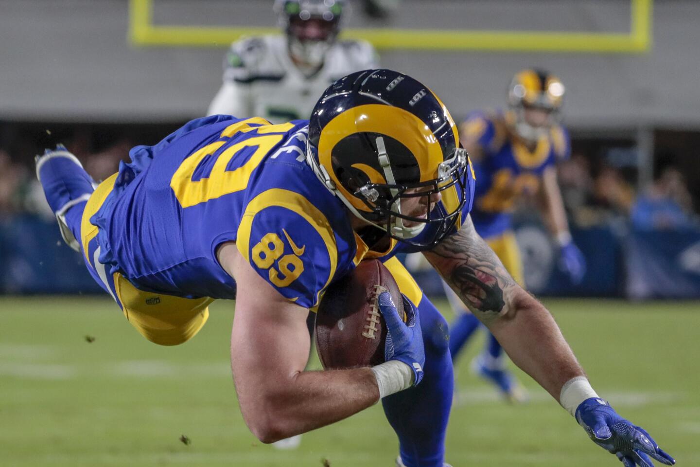 Rams tight end Tyler Higbee hauls in a pass.