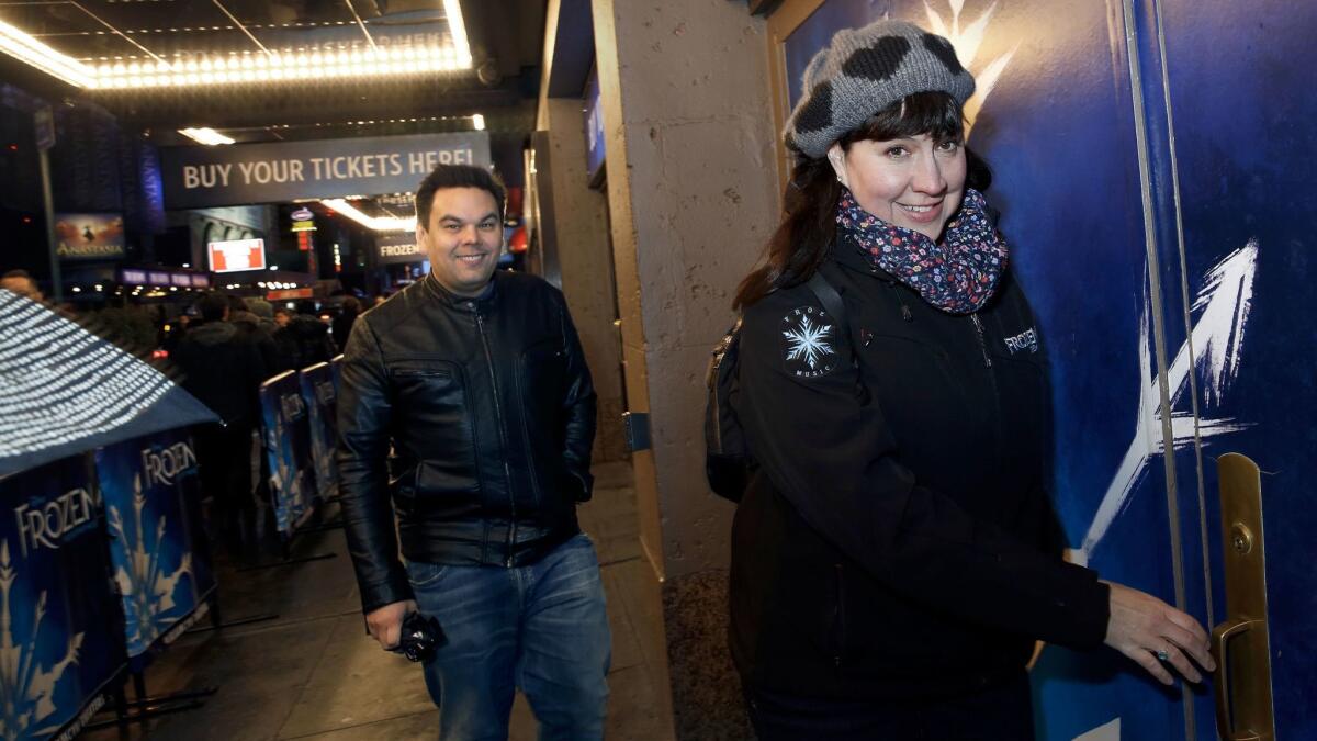 Songwriters Robert Lopez and Kristen Anderson-Lopez arrive for the first preview of "Frozen."