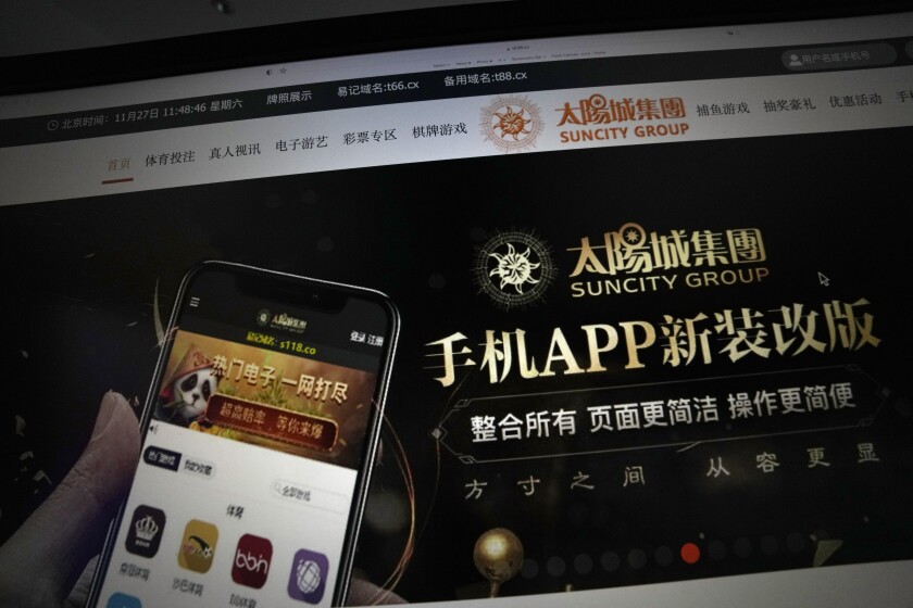 La web de Suncity Group vista en la pantalla de una computadora en Beijing, China, el 27 de noviembre de 2021. (AP Foto/Ng Han Guan)