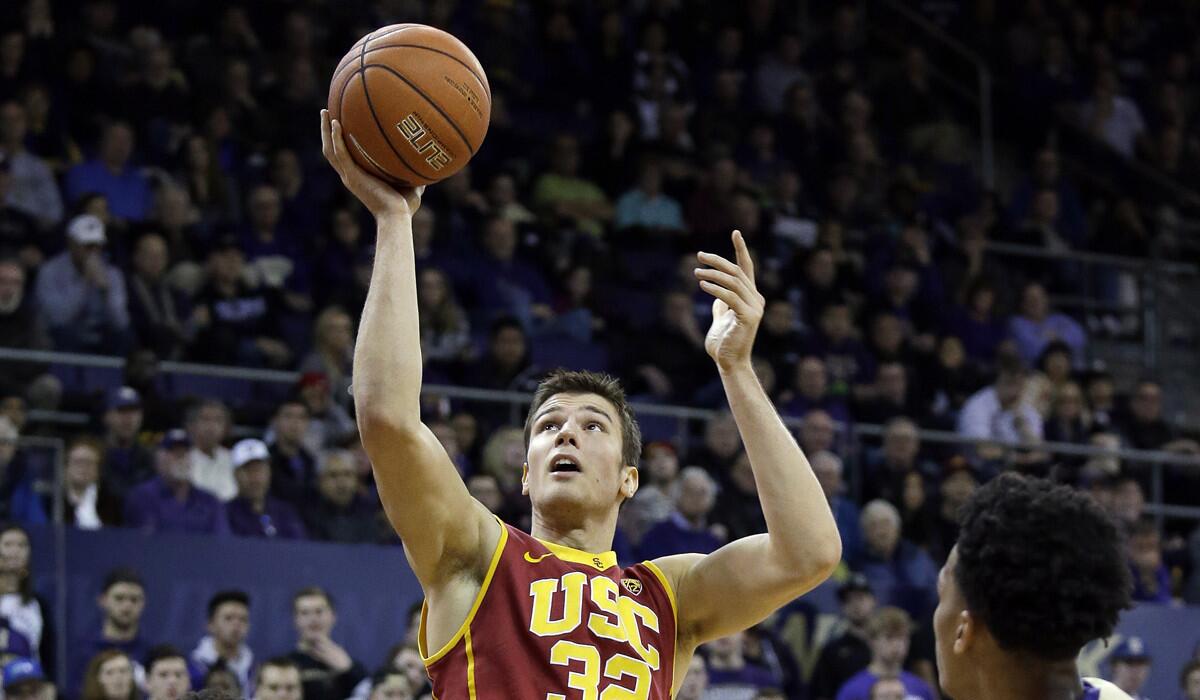 USC's Nikola Jovanovic shoots toward the basket during the first half against Washington on Sunday.