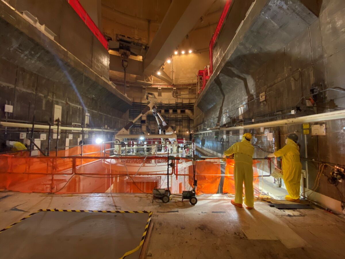 Crews at the San Onofre Nuclear Generating Station work on dismantlement efforts inside Unit 2.