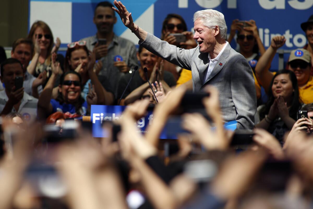 Former President Bill Clinton campaigns for his wife at the Los Angeles Trade-Technical College in Los Angeles on April 3.