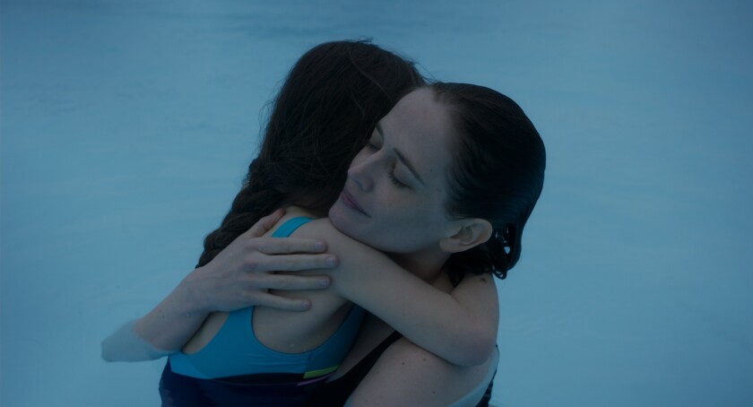 Eva Green, right, and Zélie Boulant-Lemesle in the movie “Proxima.”