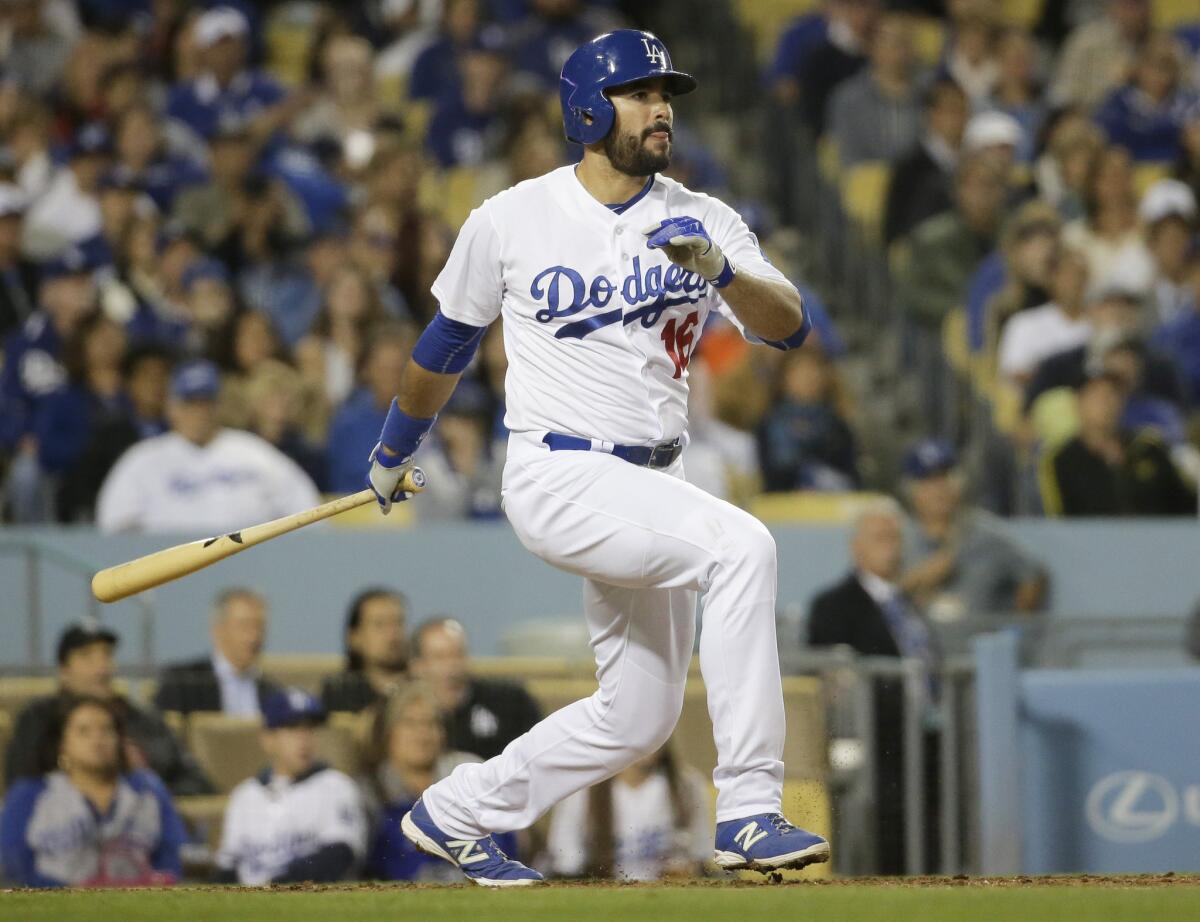 Dodgers outfielder Andre Ethier lines a single against the Marlins during the fifth inning.