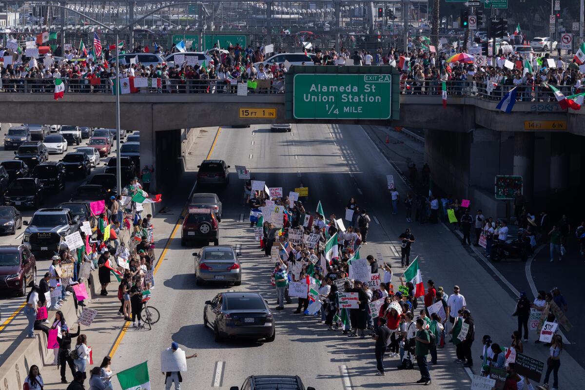 Thousands rally in L.A., shut down 101 to protest Trump deportations ...