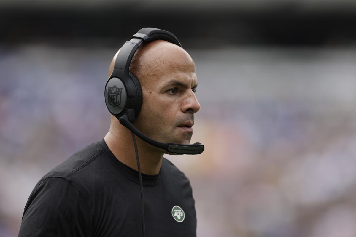 FILE - New York Jets head coach Robert Saleh works the sidelines in the first half of a preseason NFL football game against the New York Giants, Sunday, Aug. 28, 2022, in East Rutherford, N.J. Saleh's New York Jets will open the NFL regular season against the Baltimore Ravens at home - just across the Hudson River from where the 9/11 attacks unfolded. Football will be played Sunday, Sept. 11, but all the cheers won't mean anyone has forgotten. Certainly not Saleh, whose oldest brother David narrowly escaped the south tower that day. (AP Photo/Adam Hunger)
