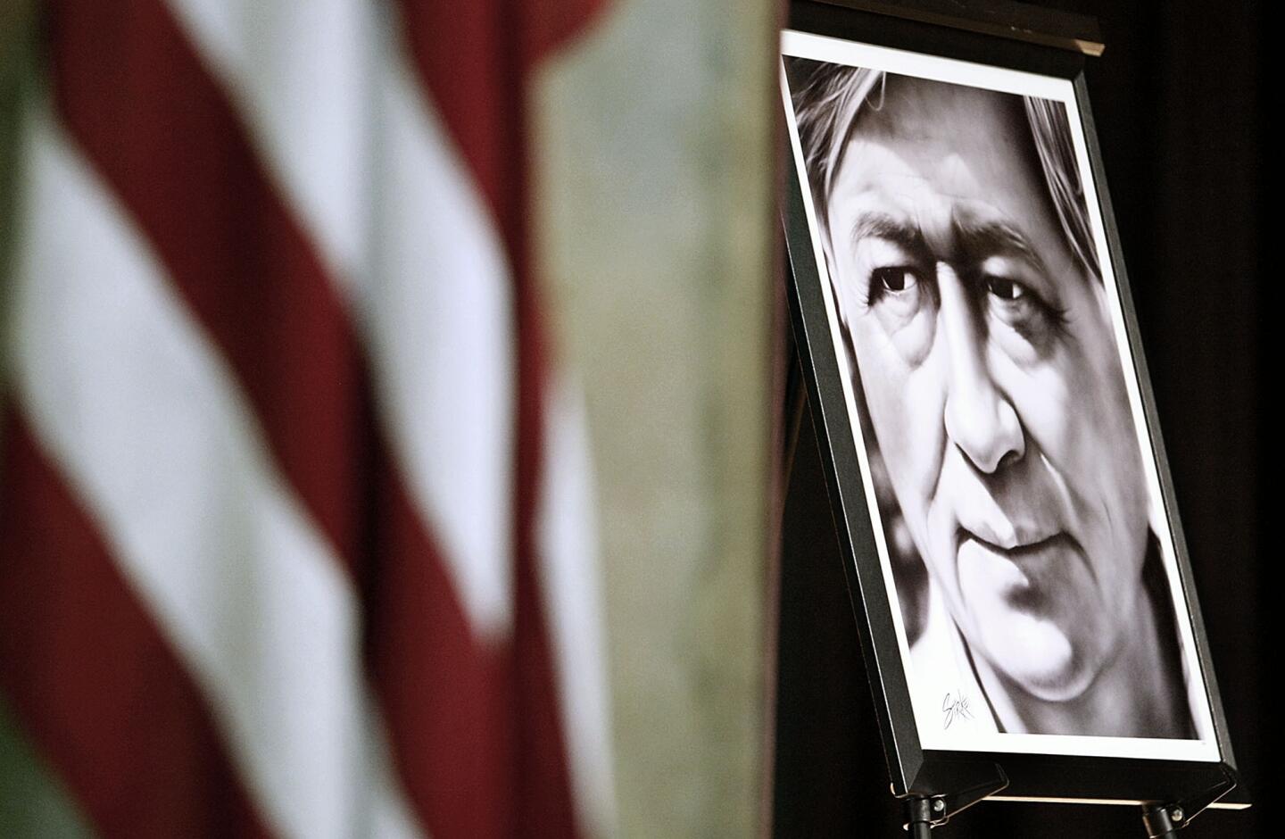 A portrait of civil rights activist Cesar Chavez was prominently displayed during the city's 12th annual Cesar Chavez celebration at Pacific Community Center in Glendale on Saturday, March 30, 2013. A mariachi played music for attendees and children played games and made arts and crafts as well.