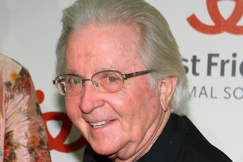 FILE - This Nov. 13, 2008 file photo shows actor Arte Johnson at the 15th Annual Lint Roller Party in Los Angeles. Johnson, who won an Emmy for comedy sketch television show Laugh-In, died in Los Angeles on Wednesday, July 3, 2019. He was 90. A family representative says Johnson died of heart failure following a three-year battle with bladder and prostate cancers. (AP Photo/Shea Walsh, File)