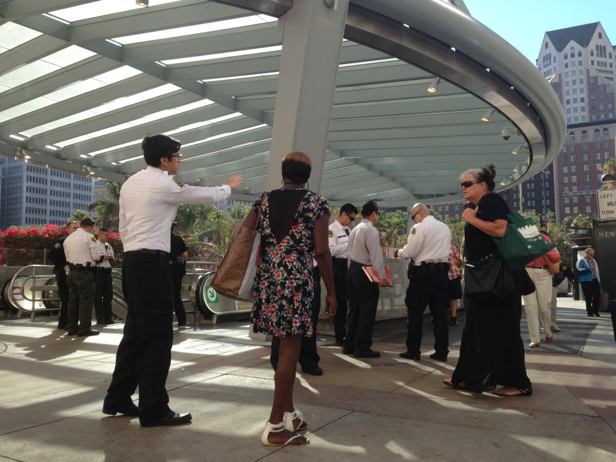 Security directs Red Line passengers away from Pershing Square Metro station due to a fatality.