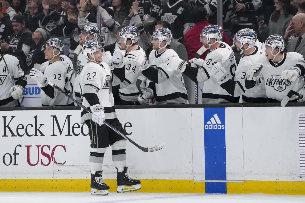 Kings teammates cheer Kevin Fiala after a goal.