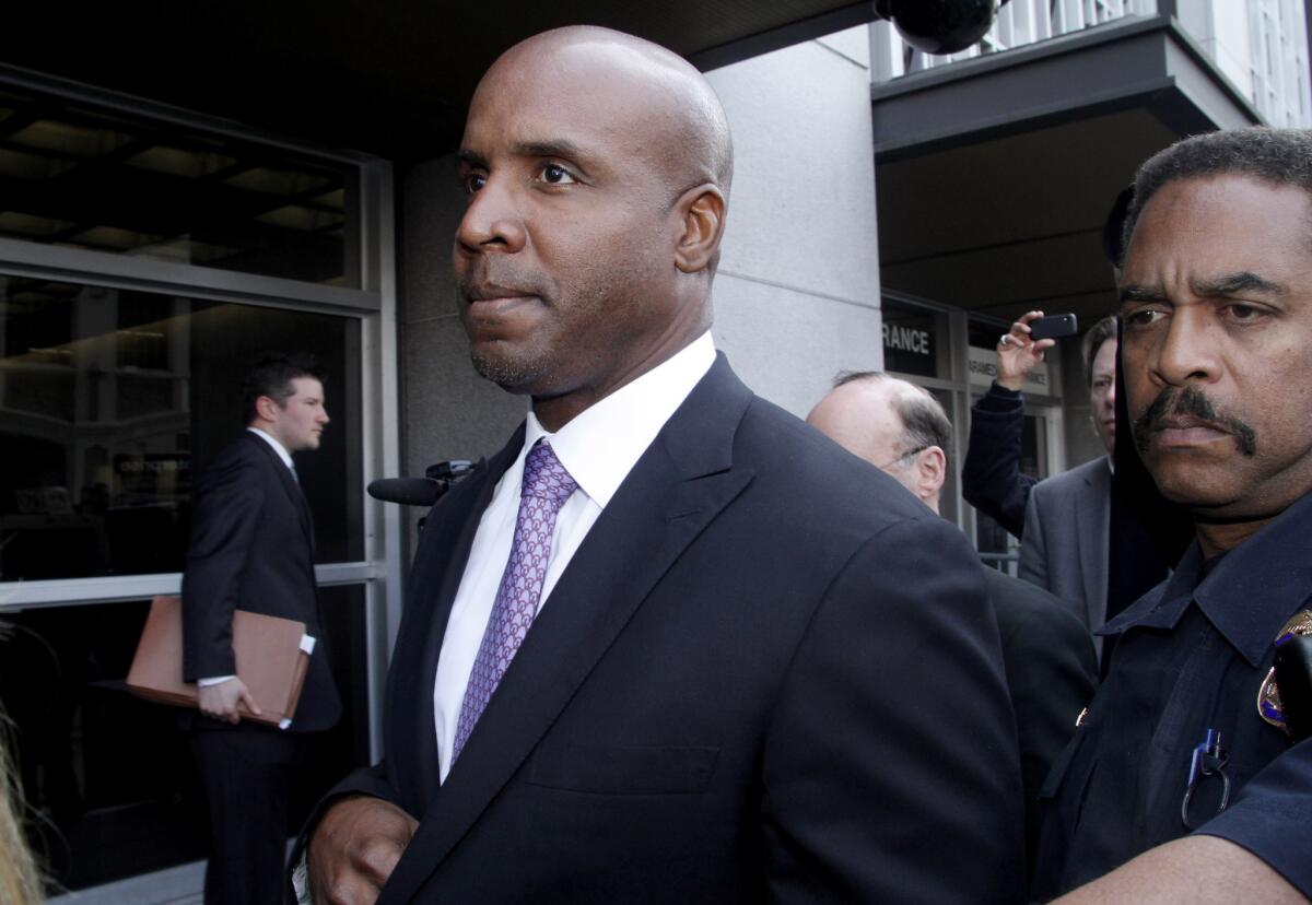 Former San Francisco Giants slugger Barry Bonds' appeal of his 2011 obstruction of justice conviction will be heard by an 11-judge panel of the U.S. 9th Circuit Court of Appeals. Above, Bonds outside court after his conviction.