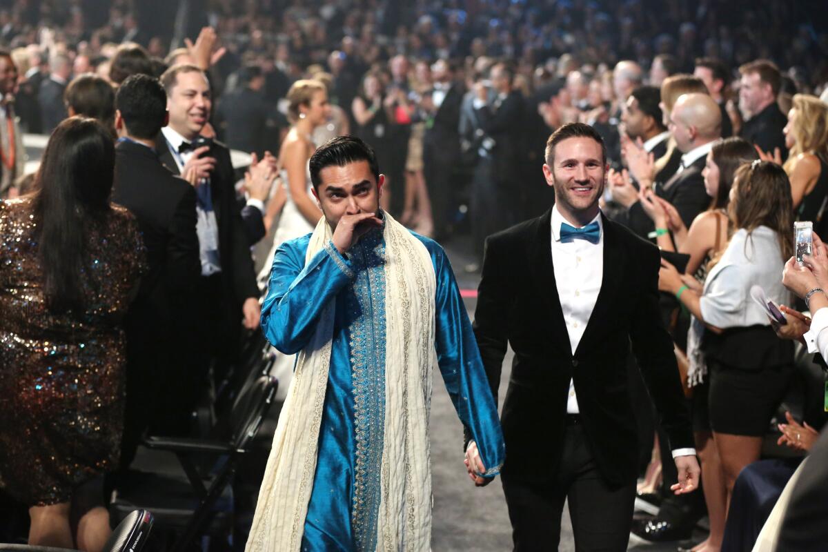 A gay couple participates in a mass wedding ceremony at the Grammy Awards at Staples Center on Sunday night.