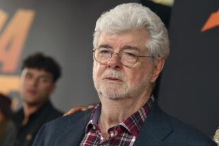 George Lucas in round glasses, a blue blazer and a checkered collared shirt.