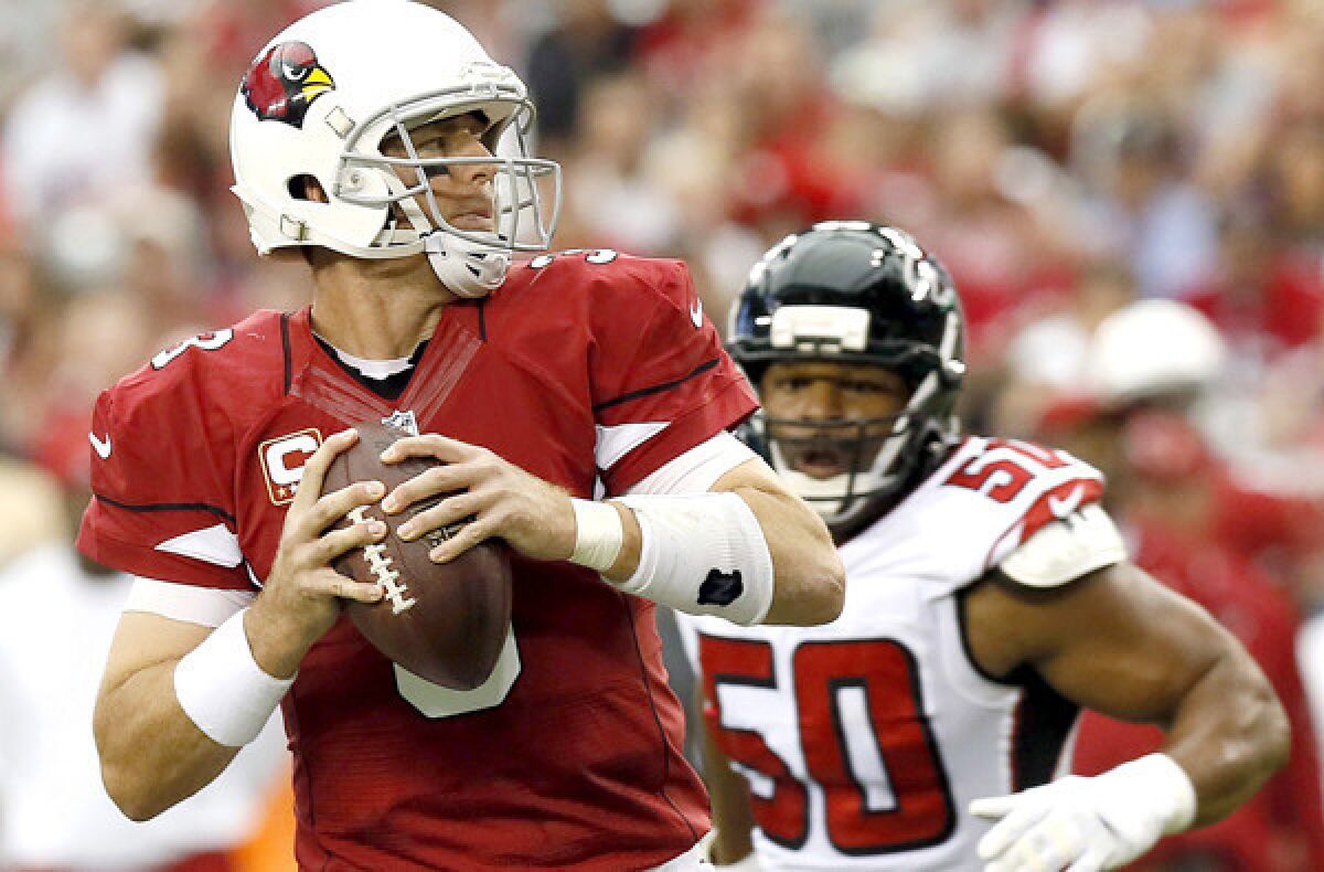 Quarterback Carson Palmer has helped the Cardinals get back on track this season.