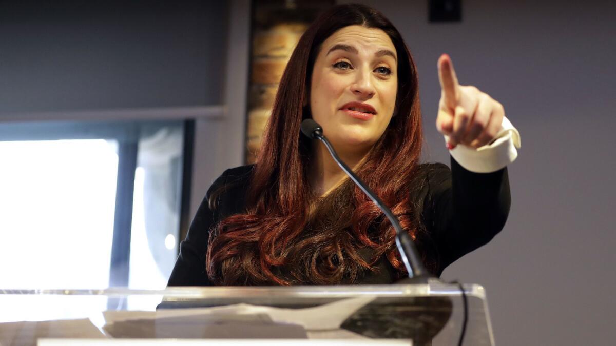 Luciana Berger, shown at a news conference Monday, said the Labour Party was “institutionally anti-Semitic.”