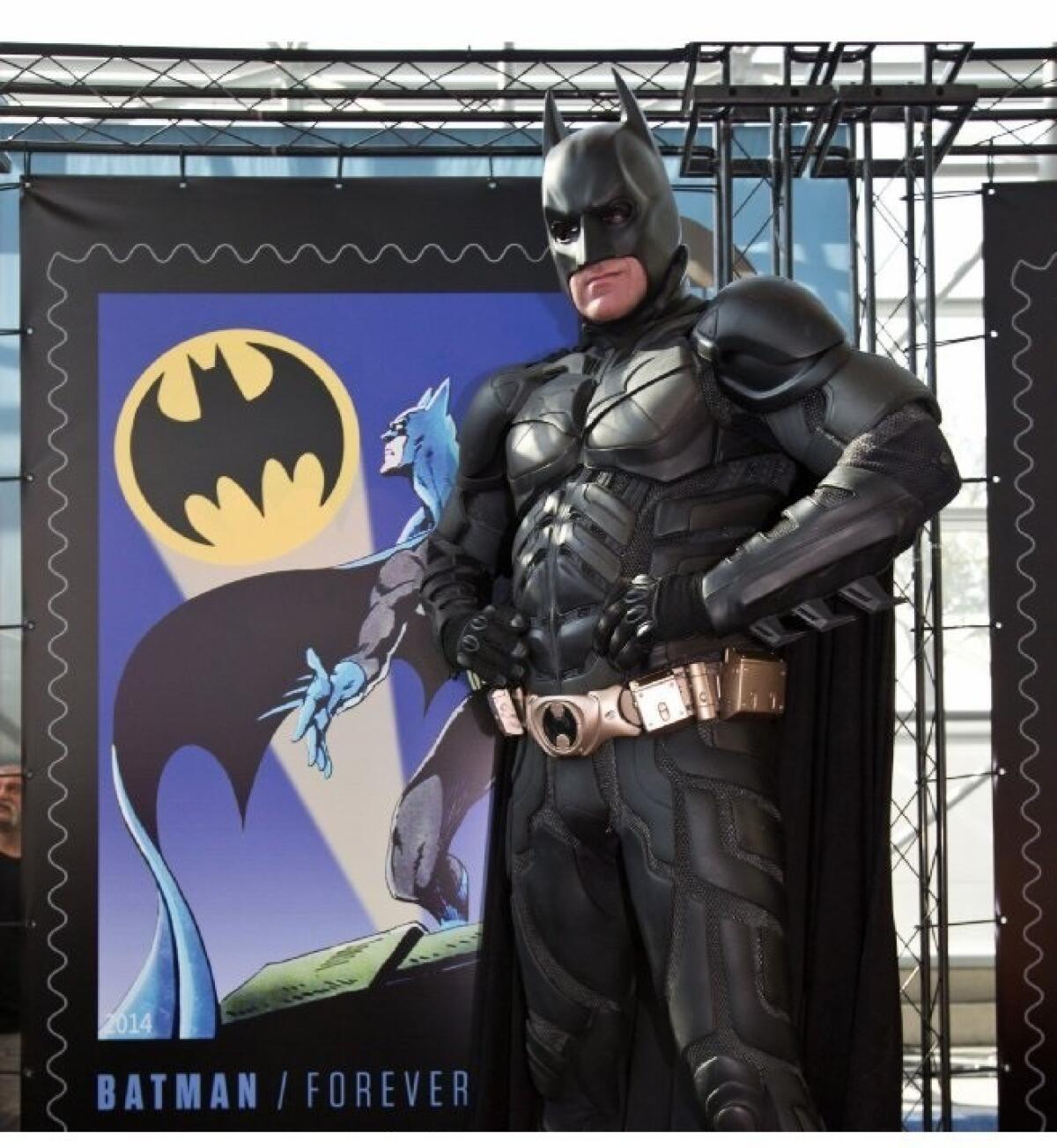 Batman swooped into New York Comic Con last month to unveil the Batman stamp series.